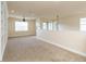 Spacious bonus room with built-in shelving and ceiling fan at 4963 Anniston Cir, Tampa, FL 33647