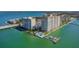 Aerial view showing waterfront location, pool, and boat slips at 5200 Brittany S Dr # 1110, St Petersburg, FL 33715