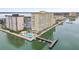 Aerial view of waterfront property with pool and private dock at 5200 Brittany S Dr # 1110, St Petersburg, FL 33715