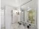 Bathroom with granite countertop, mirror, and shower at 5200 Brittany S Dr # 1110, St Petersburg, FL 33715