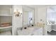 Bathroom with granite countertop and large mirror at 5200 Brittany S Dr # 1110, St Petersburg, FL 33715