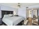 Bedroom with water view, ceiling fan, and chair at 5200 Brittany S Dr # 1110, St Petersburg, FL 33715