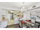 Open kitchen features white cabinets and updated appliances at 5200 Brittany S Dr # 1110, St Petersburg, FL 33715