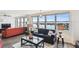 Living area with water views, comfortable seating and hardwood floors at 5200 Brittany S Dr # 1110, St Petersburg, FL 33715
