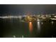 Night view of waterfront property and city lights at 5200 Brittany S Dr # 1110, St Petersburg, FL 33715