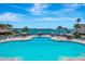 Resort-style pool with ample lounge chairs and waterfront views at 5200 Brittany S Dr # 1110, St Petersburg, FL 33715