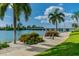 Peaceful waterfront walkway with lush landscaping at 5200 Brittany S Dr # 1110, St Petersburg, FL 33715