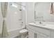 Clean bathroom with a shower/tub combo and white vanity at 5418 Wayfarer Ave, Apollo Beach, FL 33572