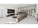 Large bonus room perfect for media and relaxation, with a large TV at 5418 Wayfarer Ave, Apollo Beach, FL 33572