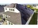 Two-story house with solar panels on the roof at 5418 Wayfarer Ave, Apollo Beach, FL 33572