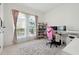 Home office featuring built-in shelving and large windows at 5418 Wayfarer Ave, Apollo Beach, FL 33572