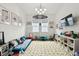 Playroom with TV, toys, and a soft play mat at 5418 Wayfarer Ave, Apollo Beach, FL 33572