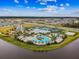Resort-style pool with water features and surrounding lounge areas at 5418 Wayfarer Ave, Apollo Beach, FL 33572