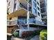 Modern building exterior with balconies and landscaping at 6104 Palma Del Mar S Blvd # 104, St Petersburg, FL 33715