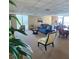 Relaxing common area with seating and large windows at 6104 Palma Del Mar S Blvd # 104, St Petersburg, FL 33715