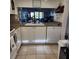 Kitchen with granite countertops and white cabinets at 6104 Palma Del Mar S Blvd # 104, St Petersburg, FL 33715
