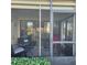 Cozy screened patio with seating and view of living area at 6104 Palma Del Mar S Blvd # 104, St Petersburg, FL 33715