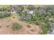 Large lot with mature trees and a house at 10809 Bartolotti Loop, Seffner, FL 33584