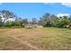 Spacious backyard with views of the house at 10809 Bartolotti Loop, Seffner, FL 33584