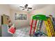 bedroom with playful decor and climbing toy at 10809 Bartolotti Loop, Seffner, FL 33584