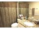 Clean bathroom with shower/tub combo and granite countertop at 11021 Edge Park Dr, Hudson, FL 34667