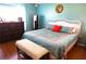 Spacious bedroom with king-size bed and soft color scheme at 11021 Edge Park Dr, Hudson, FL 34667