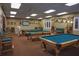 Well-equipped clubhouse game room with pool tables at 11021 Edge Park Dr, Hudson, FL 34667