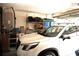 Garage with shelving and storage for seasonal items at 11021 Edge Park Dr, Hudson, FL 34667