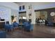 Elegant clubhouse lobby with seating area and fireplace at 11021 Edge Park Dr, Hudson, FL 34667