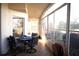 Bright sunroom features a table and chairs, perfect for relaxing at 11021 Edge Park Dr, Hudson, FL 34667