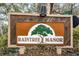 RainTree Manor community entrance sign at 11805 Northtrail Ave, Temple Terrace, FL 33617