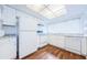 Clean kitchen with white cabinets, granite counters, and appliances at 11805 Northtrail Ave, Temple Terrace, FL 33617