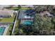 Aerial view of home with screened pool at 1206 Meadowcrest Dr, Valrico, FL 33594