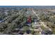 Aerial view showing home's location in a residential neighborhood with a pool at 1206 Meadowcrest Dr, Valrico, FL 33594