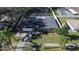 Aerial view of house, driveway and yard at 1206 Meadowcrest Dr, Valrico, FL 33594