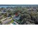 Aerial view of house, pool, and surrounding neighborhood at 1206 Meadowcrest Dr, Valrico, FL 33594
