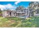 Backyard with screened-in pool and lush lawn at 1206 Meadowcrest Dr, Valrico, FL 33594