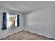 Cozy bedroom with window and neutral colored carpet at 1206 Meadowcrest Dr, Valrico, FL 33594