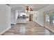 Kitchen features granite countertops, stainless steel appliances, and white cabinets at 1206 Meadowcrest Dr, Valrico, FL 33594