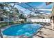 Screened-in pool with spacious deck area at 1206 Meadowcrest Dr, Valrico, FL 33594