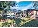 Screened-in pool with surrounding patio at 1206 Meadowcrest Dr, Valrico, FL 33594