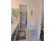 Bathroom with double vanity and walk-in closet at 14130 Rosemary Ln # 6214, Largo, FL 33774