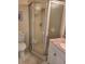 Bathroom with shower and granite countertop at 14130 Rosemary Ln # 6214, Largo, FL 33774