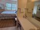 Bathroom with vanity, toilet and shower at 14130 Rosemary Ln # 6214, Largo, FL 33774