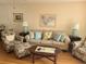 Living area showcasing neutral decor and comfortable furnishings at 14130 Rosemary Ln # 6214, Largo, FL 33774