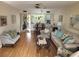 Living room with dining area and open kitchen at 14130 Rosemary Ln # 6214, Largo, FL 33774