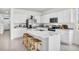 Modern kitchen with white cabinets and marble countertops at 1500 Hammer Pl, Largo, FL 33774