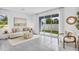 Bright living room with sliding glass doors leading to backyard at 1500 Hammer Pl, Largo, FL 33774