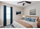 Serene bedroom with queen bed and teal accents at 15084 Mcgraw Ave, Port Charlotte, FL 33953