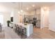 Modern kitchen with island and stainless steel appliances at 15084 Mcgraw Ave, Port Charlotte, FL 33953